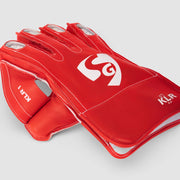 SG KLR 1 Blue/Red wicketkeeping gloves, leather and cuff detail
