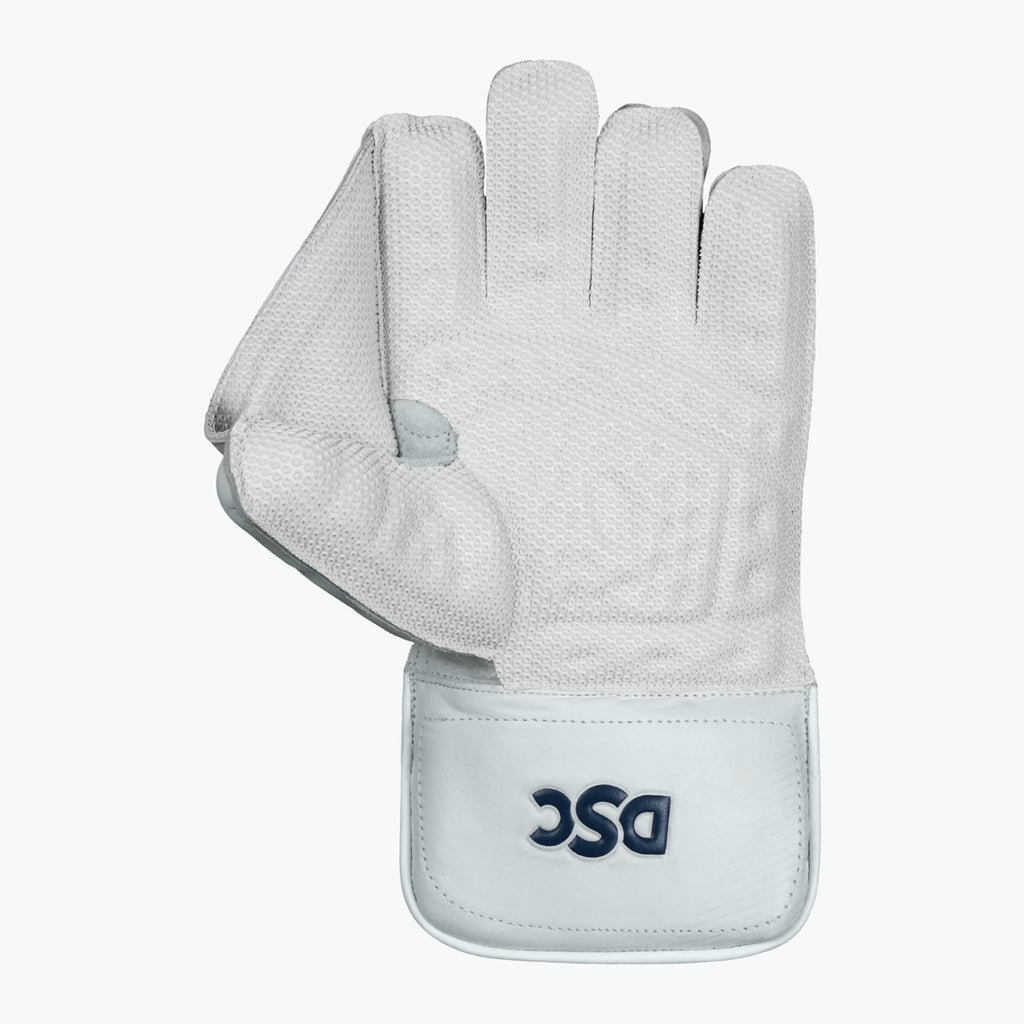 DSC Intense Pro adult wicketkeeping glove open palm showing textured grip and thumb webbing