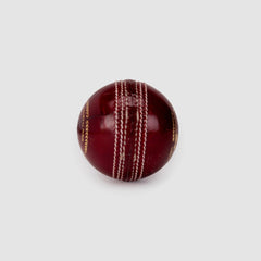 SG Shield 30 Red Youth Leather Cricket Ball seam view