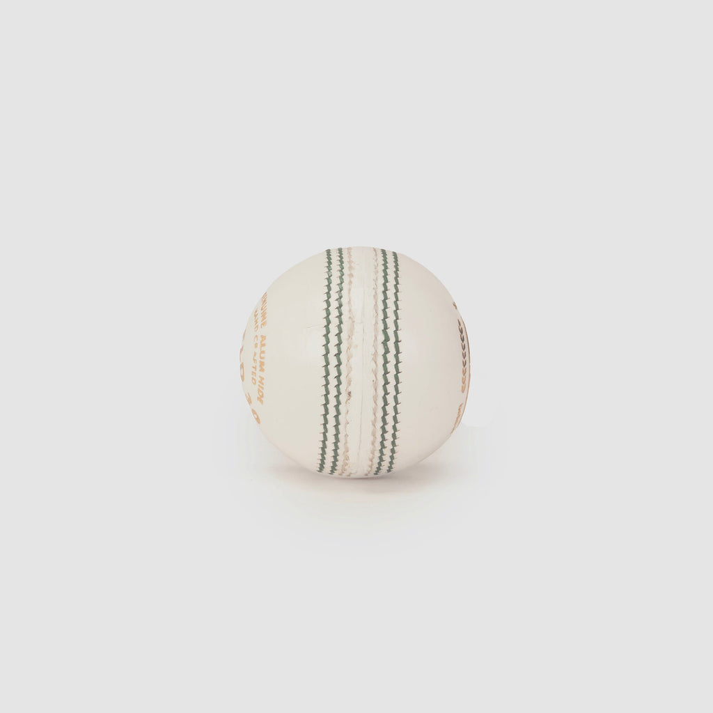SG Shield 30 White Youth Leather Cricket Ball seam view